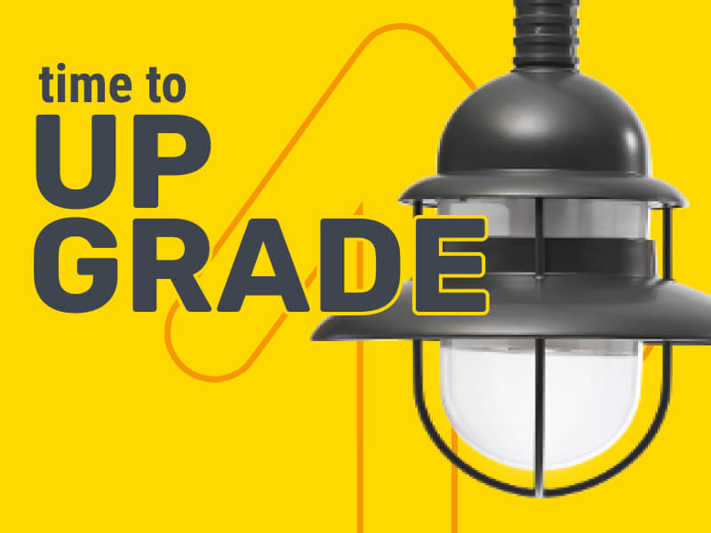 gelbes Visual mit Pfeil, Straßenleuchte und Text "time to upgrade"